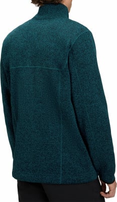 Grüner Pullover mit hohem Kragen und gestepptem Vorderteil. Grüner Pullover mit hohem Kragen und gestepptem Vorderteil.