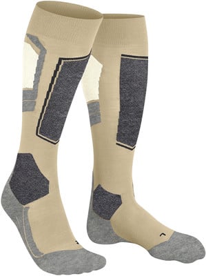 Zwei beige Skisocken mit grauen und weißen Farbblöcken. Zwei beige Skisocken mit grauen und weißen Farbblöcken.