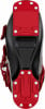Blick von unten auf schwarze Skischuhe mit roter Sohle und Atomic-Logo.