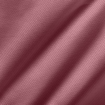 Rosa Stoff mit feiner Textur und Falten. Rosa Stoff mit feiner Textur und Falten.