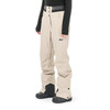 Beige Skihose mit schwarzen Details und Markenlogo am Bein.