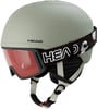 Skihelm mit integrierter Skibrille und Riemen mit Astronautenmotiv.