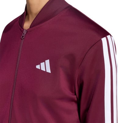Burgunderrote Adidas Jacke mit weißem Logo und Streifen an den Ärmeln.