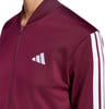 Burgunderrote Adidas Jacke mit weißem Logo und Streifen an den Ärmeln.