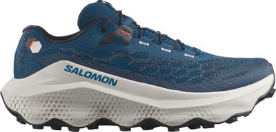 Blaue Salomon Laufschuhe mit weißer Sohle und Markenlogo. Blaue Salomon Laufschuhe mit weißer Sohle und Markenlogo.