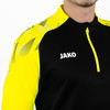 Schwarzes Sweatshirt mit gelben Ärmeln und JAKO Logo.