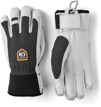 Ein Paar Lederhandschuhe mit Textilpaneelen und Hestra-Logo.