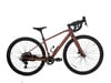 Ein braunes Gravelbike mit schwarzen Rädern und Lenker, auf weißem Hintergrund.