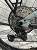 Detail des Schaltwerks und der Kassette eines Mountainbikes.