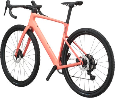 Ein rosafarbenes Scott Gravelbike mit Scheibenbremsen und breiten Reifen. Ein rosafarbenes Scott Gravelbike mit Scheibenbremsen und breiten Reifen.