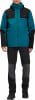 Ein Mann in einer blau-schwarzen Jacke und schwarzen Hosen mit grauen Einsätzen.