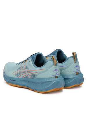 Dámské běžecké boty Asics světle modré s oranžovou podrážkou. Dámské běžecké boty Asics světle modré s oranžovou podrážkou.