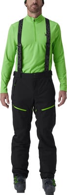 Skianzug mit leuchtend grüner Jacke und schwarzer Hose. Skianzug mit leuchtend grüner Jacke und schwarzer Hose.
