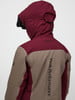 Rückansicht einer Peak Performance Jacke mit Kapuze und Logo.