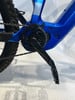 Detail eines E-Mountainbikes mit Kette und Kurbelgarnitur.