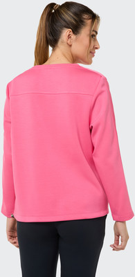 Rückansicht einer Frau in einem rosa Langarmshirt und schwarzen Leggings. Rückansicht einer Frau in einem rosa Langarmshirt und schwarzen Leggings.