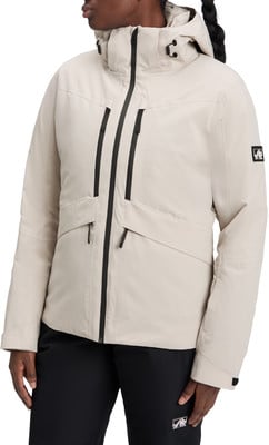 Damen-Beige-Jacke mit schwarzen Reißverschlüssen und Logo auf dem Ärmel.