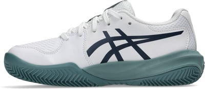 Weißer Tennisschuh mit dunkelblauen Streifen und türkisfarbenem Sohle. Weißer Tennisschuh mit dunkelblauen Streifen und türkisfarbenem Sohle.