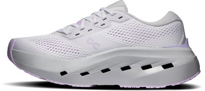 Weiße Laufschuhe mit lila Details und dicker Sohle.