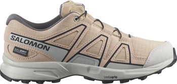 Sandfarbener Damen-Wanderschuh von Salomon mit schwarzen und grauen Details.