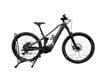 Graues E-Mountainbike auf Ständer mit Federung vorne und hinten.