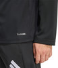 Detail einer schwarzen Jacke mit CLIMACOOL-Logo und Ärmel.