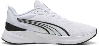 Weiße Puma-Laufschuhe mit schwarzen Streifen und weißer Sohle. Weiße Puma-Laufschuhe mit schwarzen Streifen und weißer Sohle.