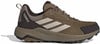 Hnědá outdoorová obuv Adidas Terrex s béžovými pruhy a tmavým detailem.