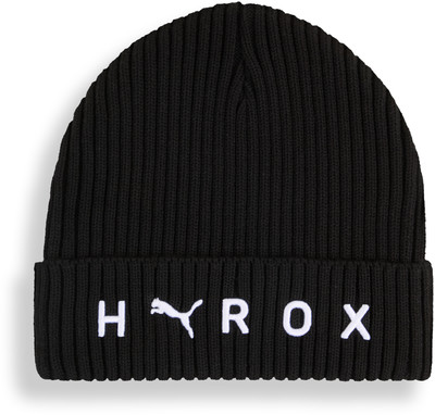 Schwarze Rippstrickmütze mit weißem Puma-Logo und HYROX-Schriftzug. Schwarze Rippstrickmütze mit weißem Puma-Logo und HYROX-Schriftzug.