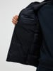 Innentasche der Jacke mit feinem Mesh und gesteppter Oberfläche.