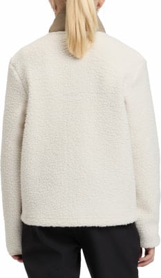 Rückansicht einer cremefarbenen Teddyjacke mit braunem Kragen. Rückansicht einer cremefarbenen Teddyjacke mit braunem Kragen.