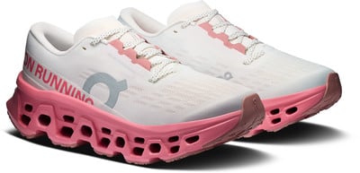 Weiße Laufschuhe mit pinker Sohle und Details, Aufschrift ON RUNNING. Weiße Laufschuhe mit pinker Sohle und Details, Aufschrift ON RUNNING.