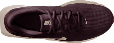 Oberansicht eines dunkelweinroten Nike-Turnschuhs mit beiger Sohle und weißem Logo.