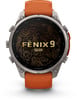 Garmin Fenix 9 Pro Smartwatch mit orangefarbenem Armband und topografischer Karte.