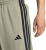 Herren-Jogginghose von Adidas mit schwarzen Streifen und Logo.