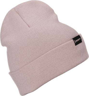 Eine rosa Strickmütze mit SCOTT-Logo auf schwarzem Aufnäher. Eine rosa Strickmütze mit SCOTT-Logo auf schwarzem Aufnäher.