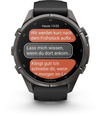 Eine Smartwatch zeigt eine Textnachrichtenkonversation an. Eine Smartwatch zeigt eine Textnachrichtenkonversation an.