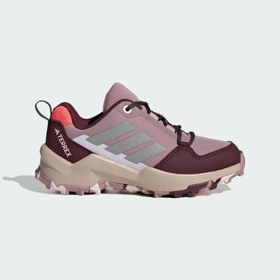 Dámská treková obuv Adidas Terrex v růžové barvě s béžovou podrážkou. Dámská treková obuv Adidas Terrex v růžové barvě s béžovou podrážkou.