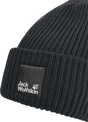 Schwarze Strickmütze mit Jack Wolfskin Logo und Pfotenabdruck.