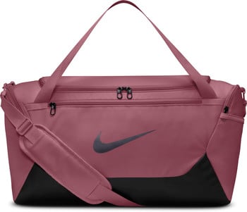 Eine rosafarbene Nike Sporttasche mit Logo und Umhängetasche.