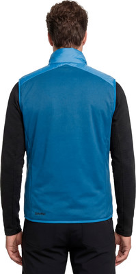 Mann von hinten in einer blauen Weste und einem schwarzen Langarmshirt. Mann von hinten in einer blauen Weste und einem schwarzen Langarmshirt.