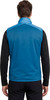 Mann von hinten in einer blauen Weste und einem schwarzen Langarmshirt.