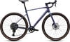 Lila Cube Gravelbike mit schwarzen Details und braunen Reifen.