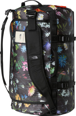 Schwarze Tasche mit Blumenmuster und Gurten von The North Face. Schwarze Tasche mit Blumenmuster und Gurten von The North Face.