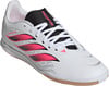 Bílá fotbalová obuv Adidas Predator s růžovými pruhy a černou tkaninou.