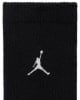 Fekete zokni fehér Jordan Jumpman logóval a közepén.