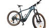 Grünes KTM Mountain E-Bike mit Federung und breiten Reifen.