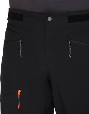 Schwarze Outdoorhose mit orangefarbenem Reißverschluss und Seitentaschen.