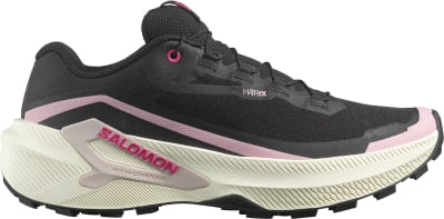 Schwarzer Salomon Laufschuh mit rosa Details und robuster Sohle. Schwarzer Salomon Laufschuh mit rosa Details und robuster Sohle.