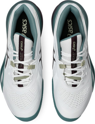 Damen-Tennisschuhe von Asics in Weiß mit dunkelgrünen Details und Schnürsenkeln. Damen-Tennisschuhe von Asics in Weiß mit dunkelgrünen Details und Schnürsenkeln.